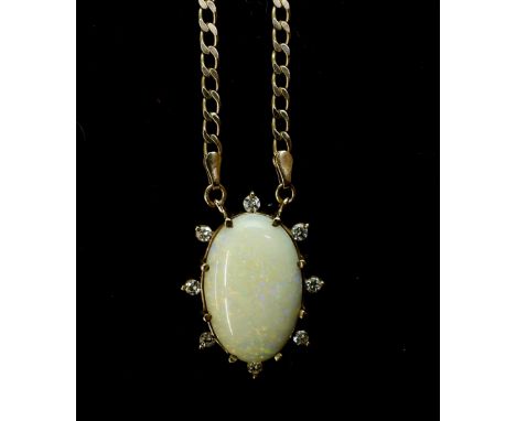 A 9ct gold large white opal and diamond pendant, set with estimated approx 0.40cts of brilliant cut diamonds dimensions of th