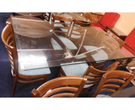 A lot comprising a contemporary glass topped chrome based dining table, 77cm high x 160cm long x 90cm deep and four stained b