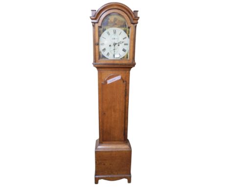 A 19th century oak cased longcase clock with painted face with white dial bearing Roman numerals and two subsidiary dials bea