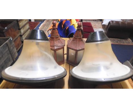 A lot comprising two contemporary industrial style ceiling light pendants and two red painted metallic candle lanterns (4) Co