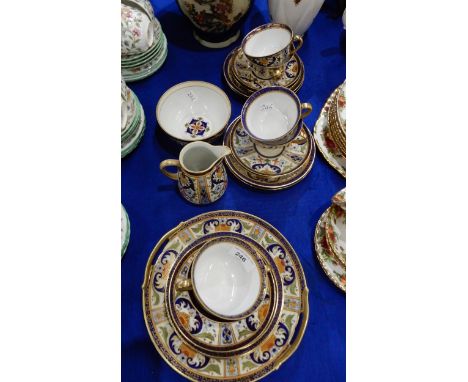 A Noritake tea set with colourful decoration and gilt on a cream ground Condition Report:Available upon request