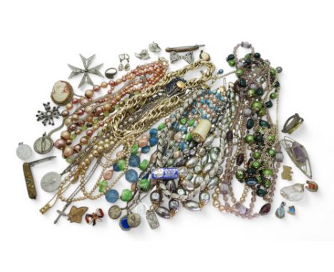 A jewellery box full of vintage costume jewellery to include a Trifari necklace and earring set, a silver Connemara marble ha