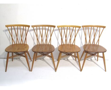 A set of four Ercol Chiltern Candlestick chairs in light elm and beech
