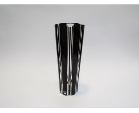 An Orrefors Martti Rytkonen designed glass vase, vertical ridged tapering body with black overlay , incised details to base, 