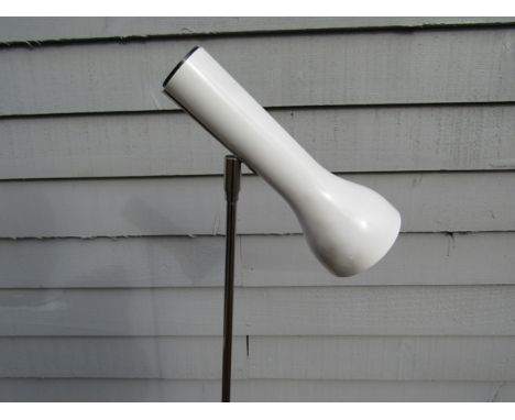 A white standard lamp with single adjustable spot