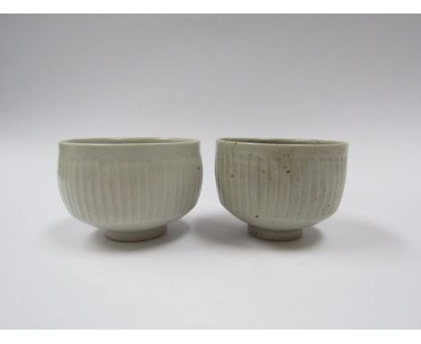 DAVID LEACH (1911-2005) A studio porcelain small fluted teabowl in pale celadon glaze, personal seal, together with a similar