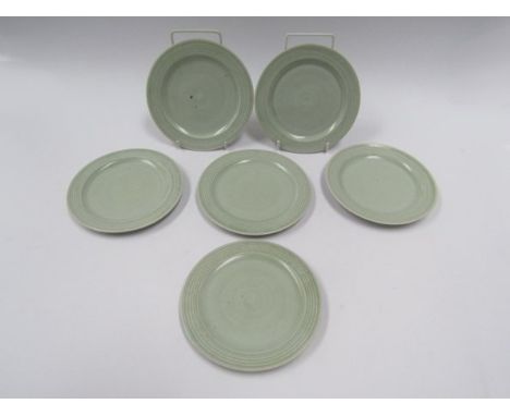 DAVID LEACH (1911-2005) A set of six porcelain plates, pale celadon glaze and incised lined rim detail. Personal seals. 17cm 