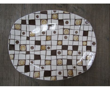 A Midwinter "Homespun" meat plate designed by Jessie Tait, 35cm long x 28cm wide
