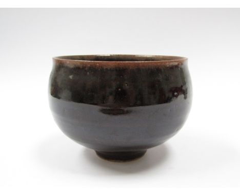 DAVID LEACH (1911-2005) A tenmoku glazed bowl. Personal seal to base. 10.5cm high (Hairline from the rim down)