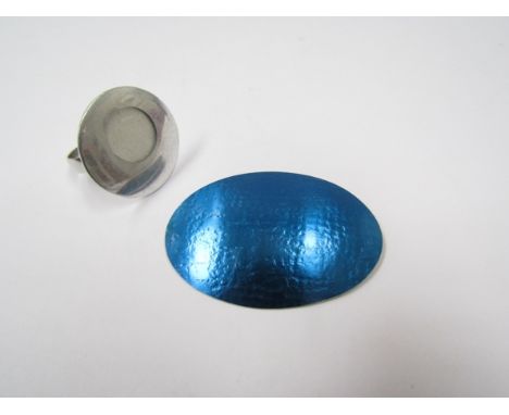 A contemporary large disc ring with window to bark effect design and blue titanium coated large oval brooch (2) 