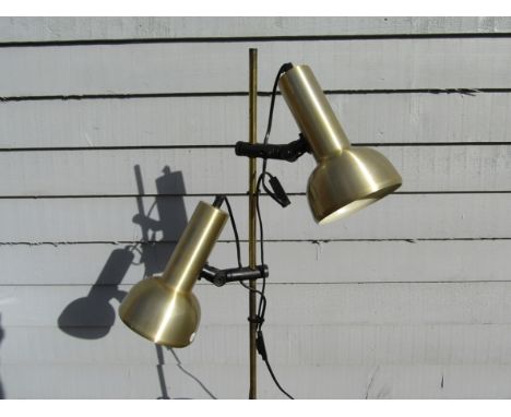 A Danish brassed standard lamp with twin adjustable spots 