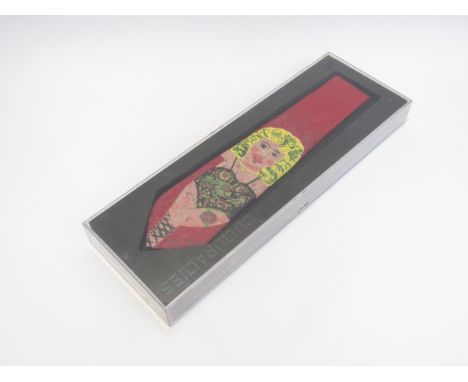 PETER BLAKE (b.1932) : A plastic cased printed tie with female portrait. Limited edition No. 191/300.