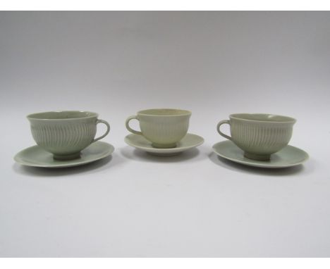 A Lowerdown Pottery pair of fluted cups with saucers together with a similar example by David Leach with personal seal