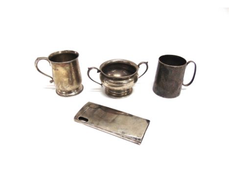 A SILVER CHRISTENING MUG by Aidie Brothers, Birmingham 1924, 8.5cm high, monogrammed; with a silver two handled sugar basin; 