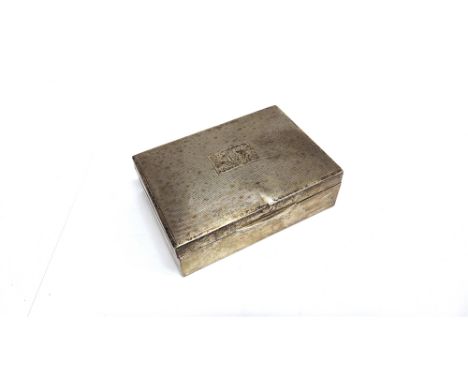 A SILVER CIGARETTE BOX wooden lined, engine turned decoration and inscribed, 12.7cm long 