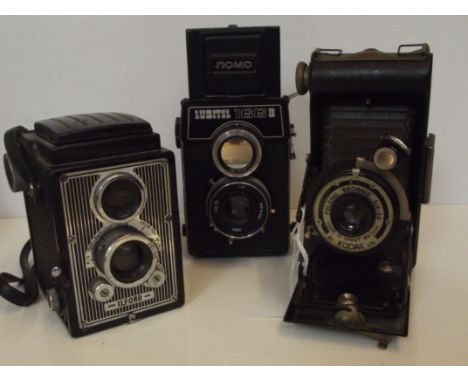 Lubitl 166b camera together with a Kodak brownie and ilford craftsman camera 