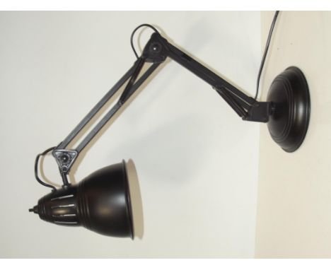 Angle poise table lamp