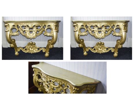 A Pair Of Ornate Console Tables Two reproduction Rococo hall/console tables with intricate apron and legs comprising scroll a