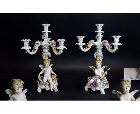 Meissen Fine Pair of Porcelain Figural - 4 Branch Candelabra, Decorated with Images of Winged Cherubs, Playing Musical Instru