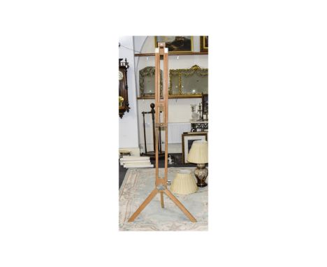 Artist's Studio Easel Fashioned in light pine, approx 60 inches in length.