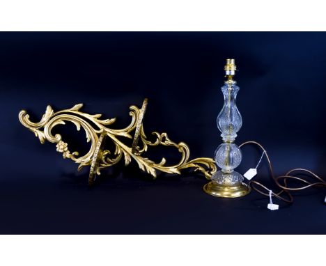 Peerart Gilt Wall Shelf 26 inches high and a glass baluster base table lamp 16 inches high. 