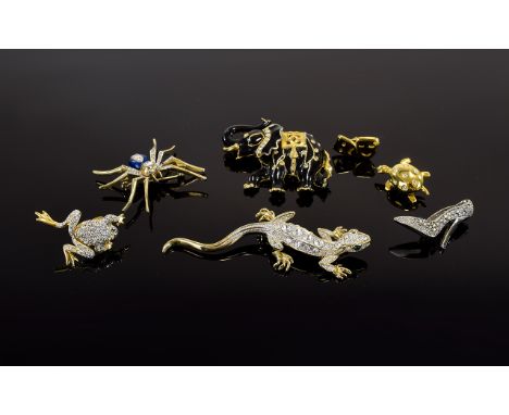 A Collection Of Crystal Set Statement Brooches Seven in total to include attractive black enamel and crystal set elephant wit