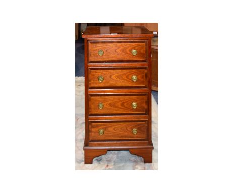 Modern Mahogany Chest Of 4 Drawers of small proportions. Raised on bracket feet. 31 inches in height. 17 x 12 inches deep. 