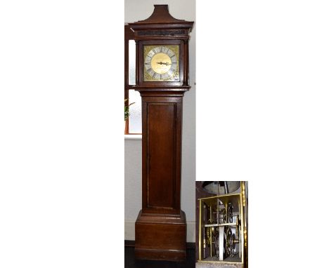 A Late 18th Century Oak Long Cased Clock Eleven inch brass dial with silver chapter ring. Maker Samuel Coxall, Royston, singl