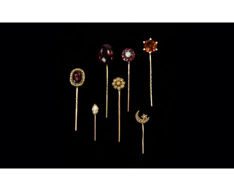 A Good Collection of 19th Century Period 9ct Gold Stone Set Stickpins ( 7 ) Seven In Total. Set with Opals, Garnets, Seed Pea