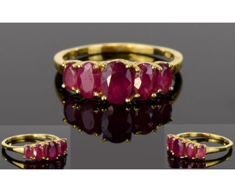 Ruby Five Stone Ring, the centre ruby being 1.25cts, with the graduated rubies to either side totalling a further 2cts, the w