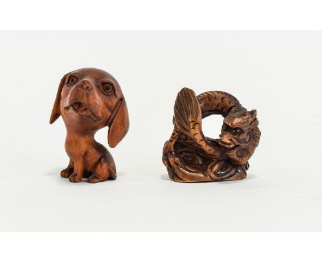 Contemporary Carved Netsuke Two in total, fashioned in dark wood  the first in the form of a coiled dragon, the second in the