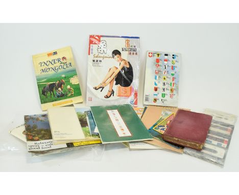 A Collection of Postcards, Photographs, Books, Cards, Stamps, Envelopes, Country guide books including Mongolia, France, Swit