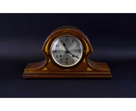 Westminster Dome Shaped Mantle Clock with silvered dial and Arabic numerals. 10 inches high and 17 inches wide.