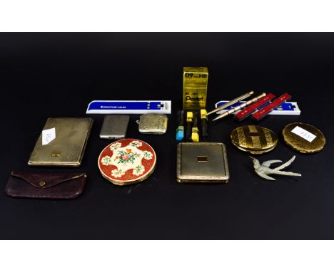 A Varied Collection Of Vintage Compacts And Ephemera A mixed collection to include, several Stratton compacts, vintage pince 