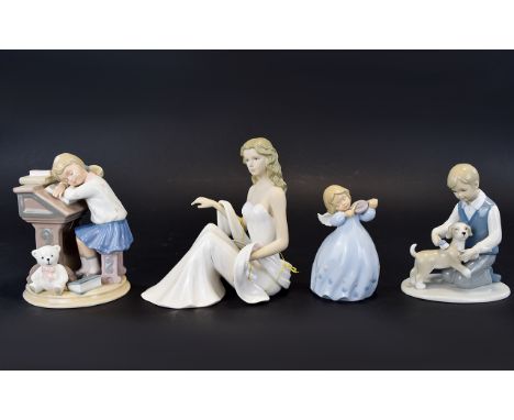 A Small Collection Of Leonardo Ceramic Figurines Four in total, each in muted blue, white and taupe tones. The first in the f