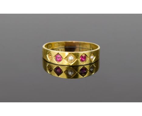 18ct Antique Ruby and Pearl Ring. Medieval style gold band set with small ruby and pearl stones, one pearl missing to shoulde