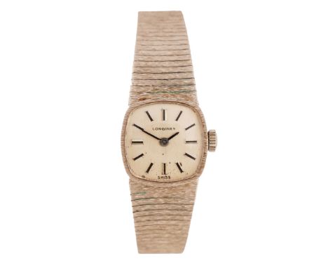 the signed silver dial with baton markers, manual wound, the case 17mm wide, on a 9 carat white gold bark effect bracelet, to