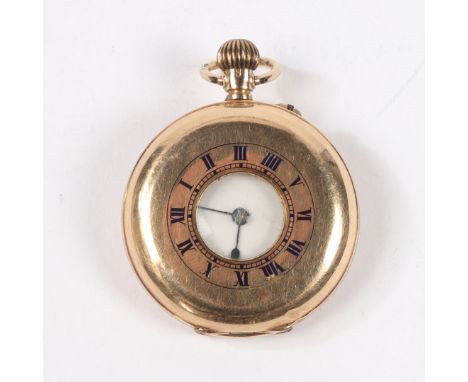 the case with import mark for London 1910, the outer case with blue enamel Roman numerals and monogrammed caseback, the white