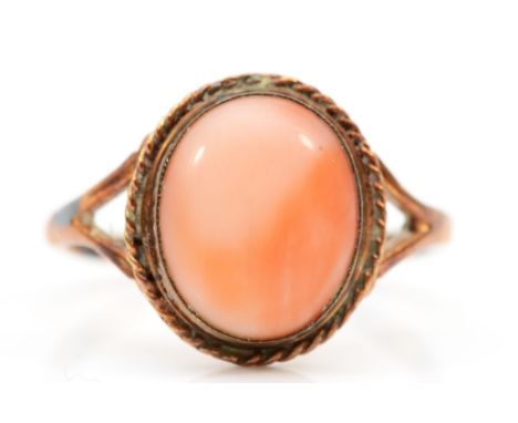 A 9ct gold coral dress ring, O-P, 2.5gm. 