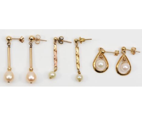 Three pairs of 9ct gold cultured pearl drop earrings, longest 28mm, 5gm. 