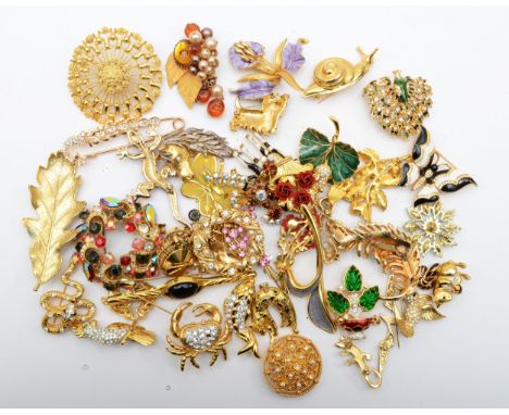 A collection of modern brooches to include faux pearl example. 
