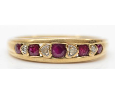 A 9ct gold ruby and diamond ring with heart shaped setting, P, 2.3gm. 