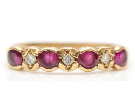 A 9ct gold ruby and brilliant cut diamond dress ring, L, 1.6gm. 