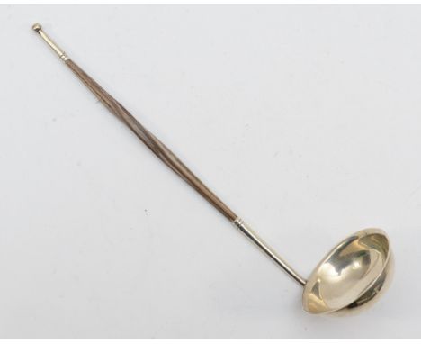 A Georgian unmarked silver toddy ladle, with whale bone twist handle, 8cm.