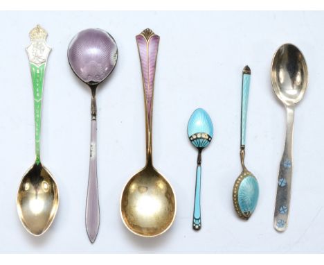 A Norwegian silver gilt and purple enamel spoon by David Anderson, and five other enameled spoons, 89gm.