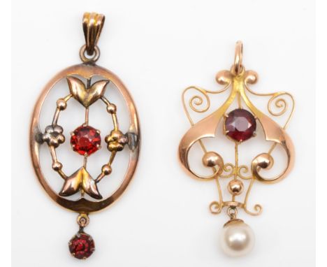 An Edwardian gold open work garnet and pearl pendant, 33 x 20mm, 9ct tab, 1.6gm, together with a paste stone example. 