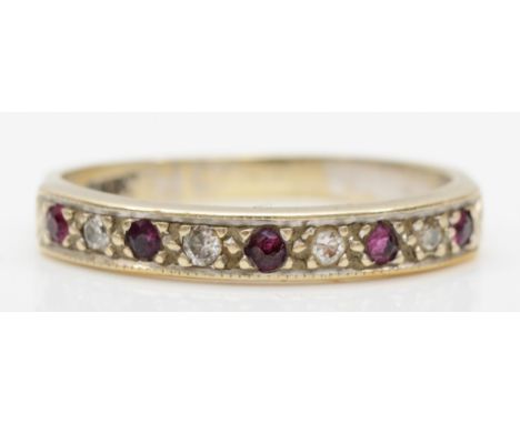 A white gold ruby and diamond ring with continental control mark, M, 2.3gm. 