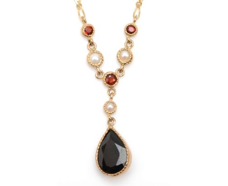 A 9ct gold garnet and seed pearl drop necklace, 22mm, 3gm. 