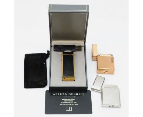 Dunhill, A black and gold plated rectangular gas lighter, 6.5cm, together with a Dupont french gold plated gas lighter, No 30