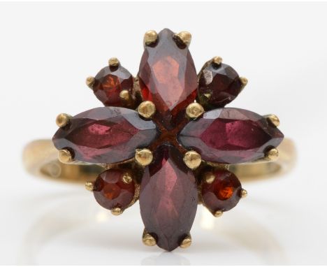 A 9ct gold garnet cluster ring, O-P, 3.7gm. 